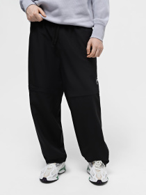 Спортивні штани PUMA DOWNTOWN 180 ZIP-OFF модель 62437801 Спортивні штани PUMA DOWNTOWN 180 ZIP-OFF модель 62437801 Фото