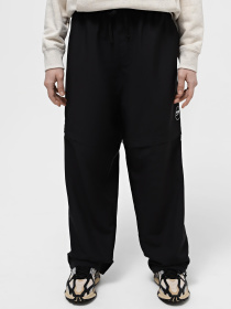 Спортивні штани PUMA DOWNTOWN 180 ZIP-OFF модель 62437801 Спортивні штани PUMA DOWNTOWN 180 ZIP-OFF модель 62437801 Фото