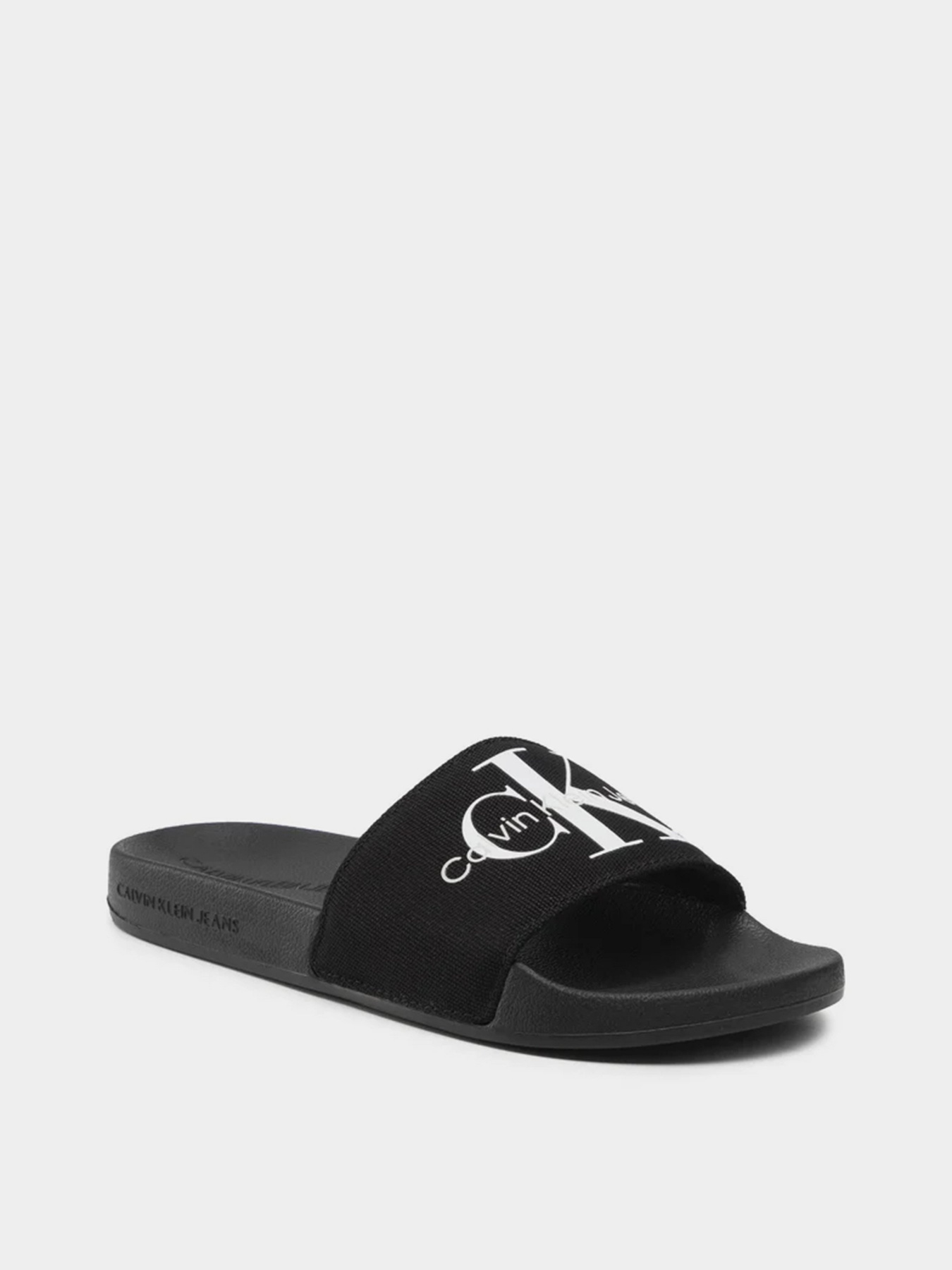 Шлепанцы Calvin Klein Slide Monogram Co модель YW0YW00103-BDS Фото