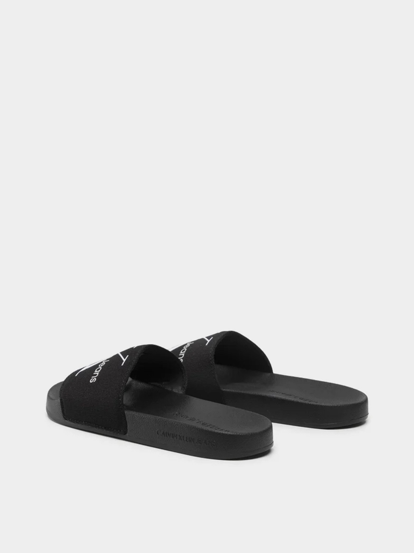 Шлепанцы Calvin Klein Slide Monogram Co модель YW0YW00103-BDS Фото