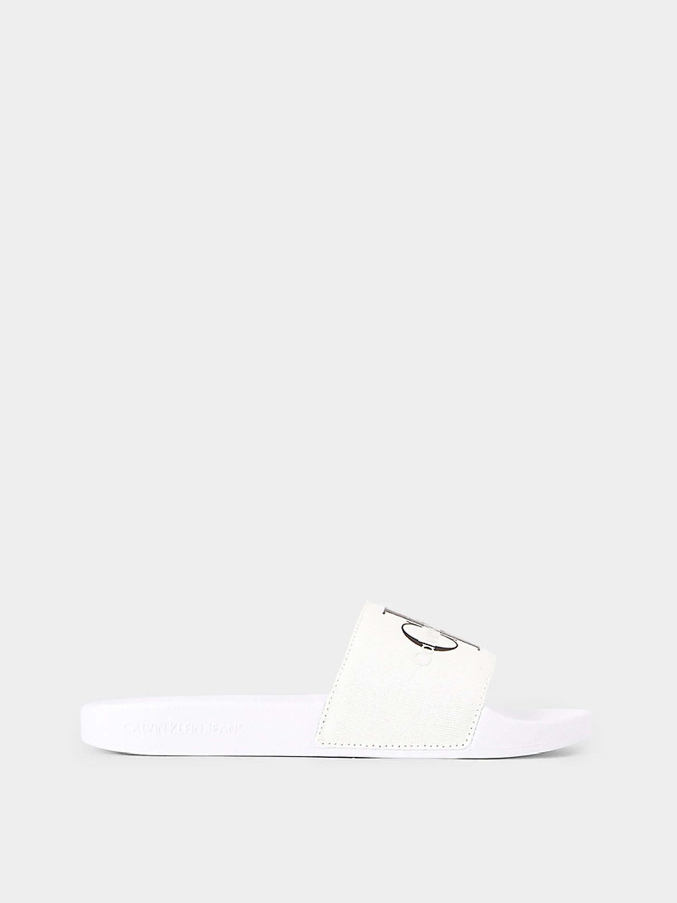 Шльопанці Calvin Klein Slide Monogram Co модель YW0YW00103-01W Шльопанці Calvin Klein Slide Monogram Co модель YW0YW00103-01W Фото