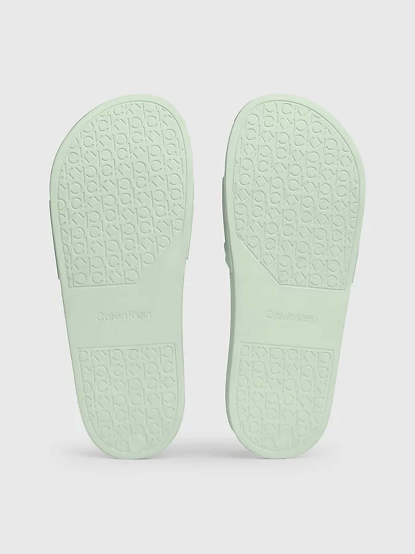 Шльопанці Calvin Klein Pool Slide Deboss Logo Tpu Модель HW0HW01976-LIA Фото