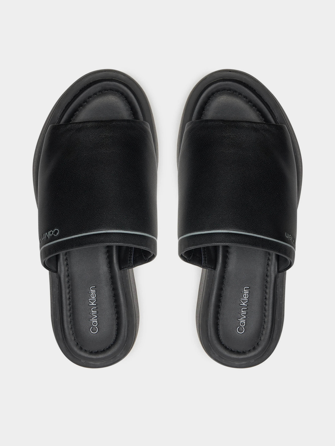 Шлепанцы Calvin Klein Flatform Slide Lth модель HW0HW01943-BEH Фото