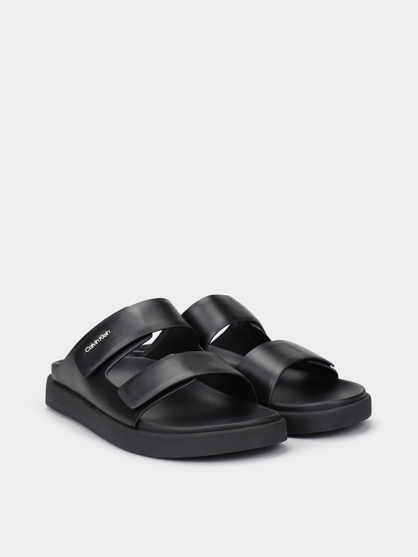 Шлепанцы Calvin Klein Flat Adj Slide Calvin Mtl Lth модель HW0HW01954-BEH Фото