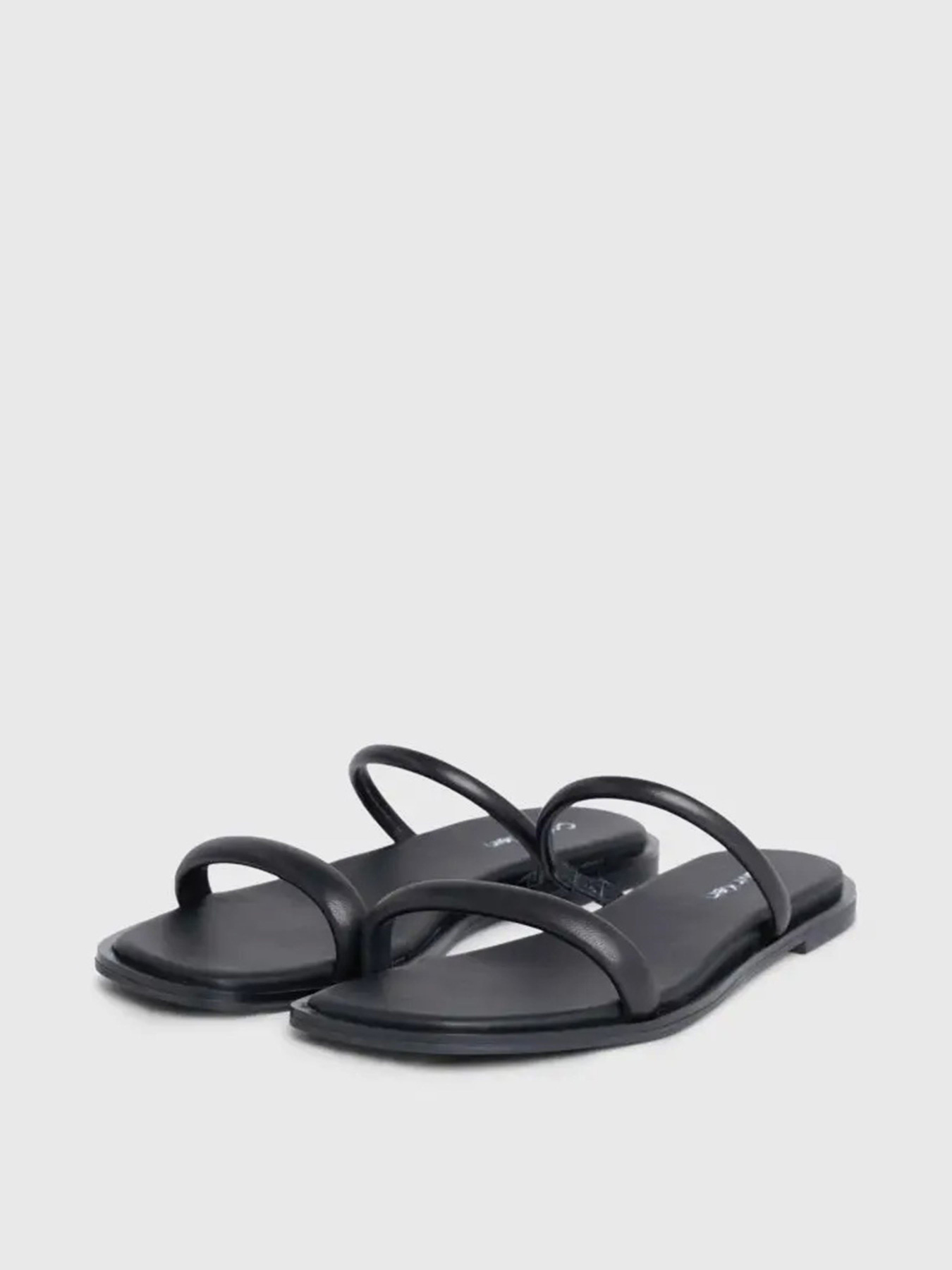 Шлепанцы Calvin Klein Flat Slide Lth модель HW0HW02127-BEH Фото