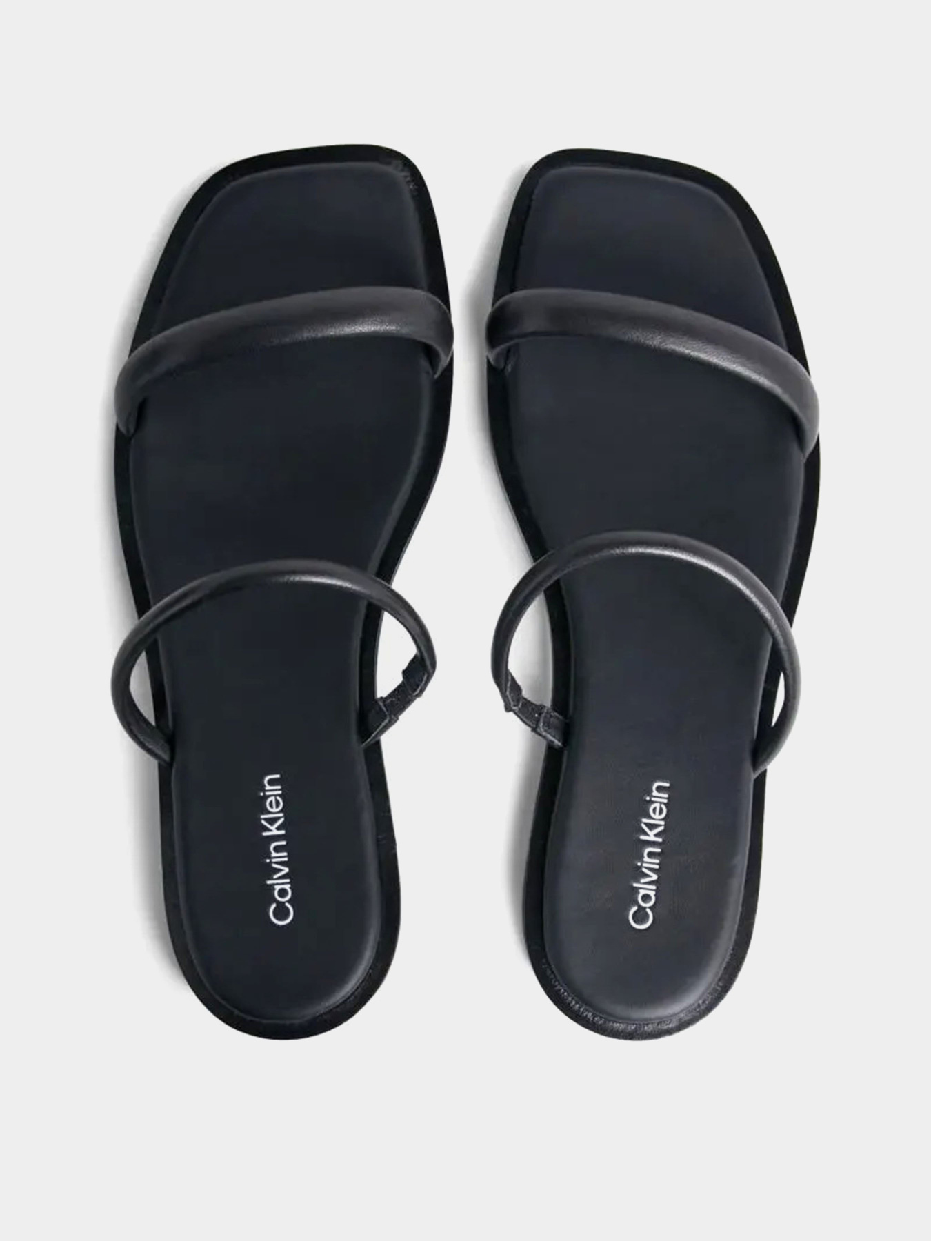 Шлепанцы Calvin Klein Flat Slide Lth модель HW0HW02127-BEH Фото