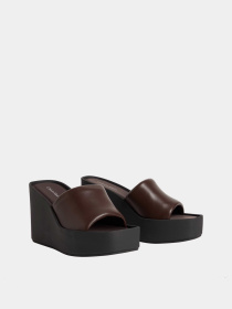 Шлёпанцы Calvin Klein WEDGE 70 SNDL MULE LTH модель HW0HW02881-0HN Фото
