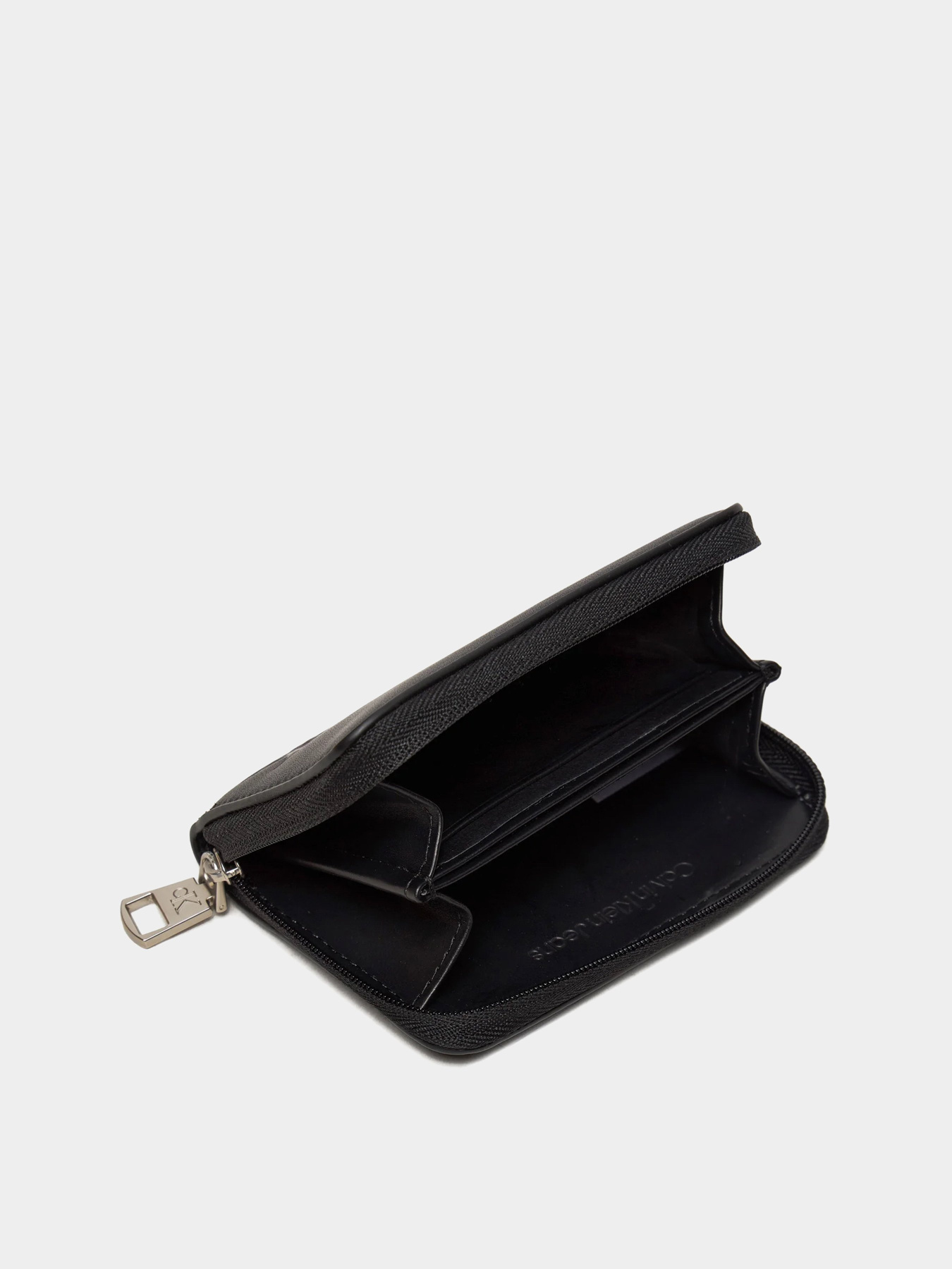 Кошелек Calvin Klein Block Med Zip Around модель K60K612254-BEH Фото