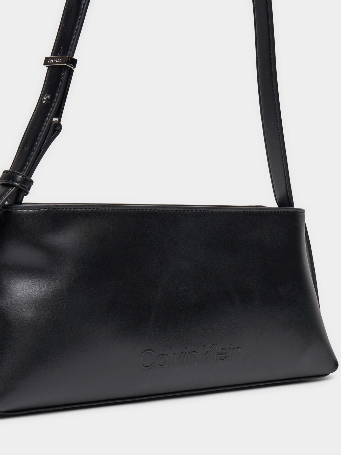 Кросс-боди Calvin Klein Embossed Logo модель K60K612550-BEH Фото