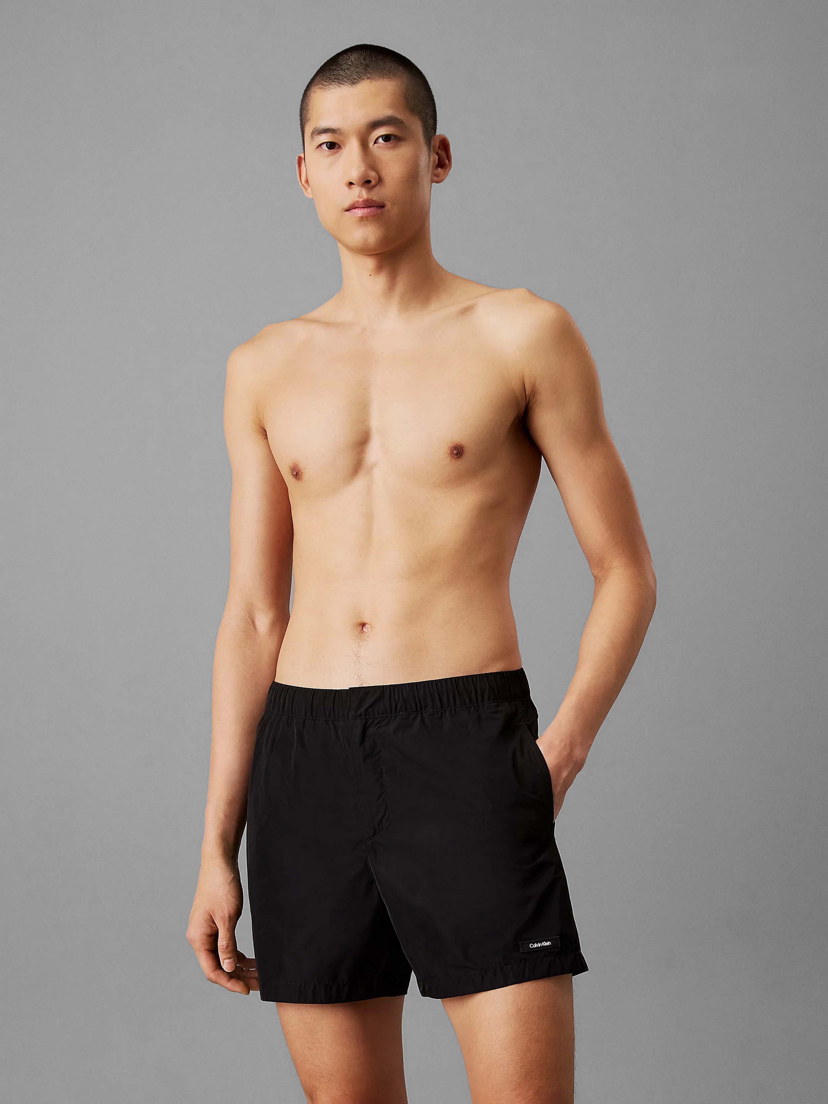 Чоловічі Шорти для плавання Calvin Klein Underwear  (CKL2179) колір темно-сірий, матеріал перероблений поліестер Calvin Klein Underwear - купити в Україні