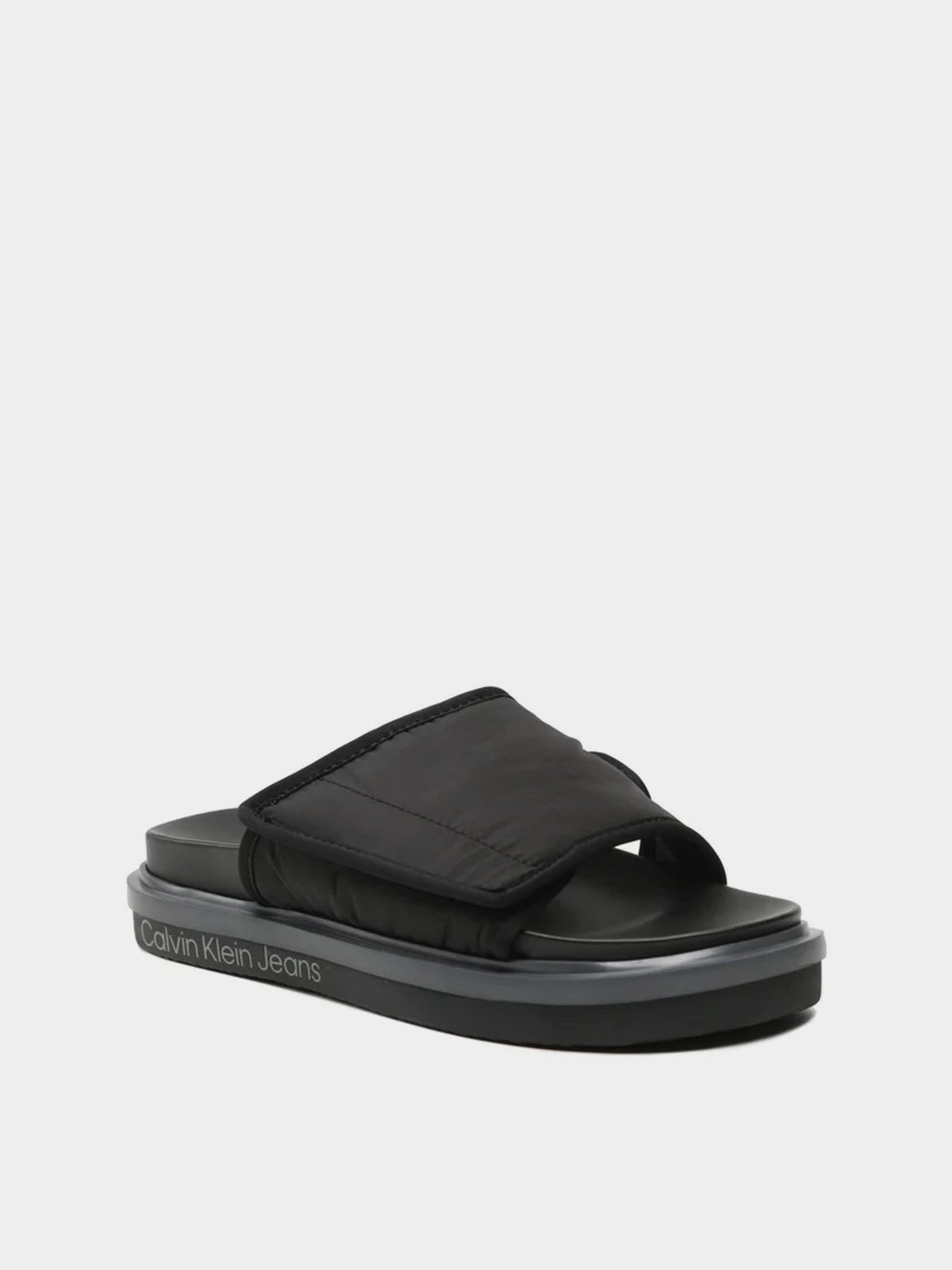 Шлепанцы Calvin Klein Sandal Slide Softny модель YM0YM00644-0GP Шлепанцы Calvin Klein Sandal Slide Softny модель YM0YM00644-0GP Фото