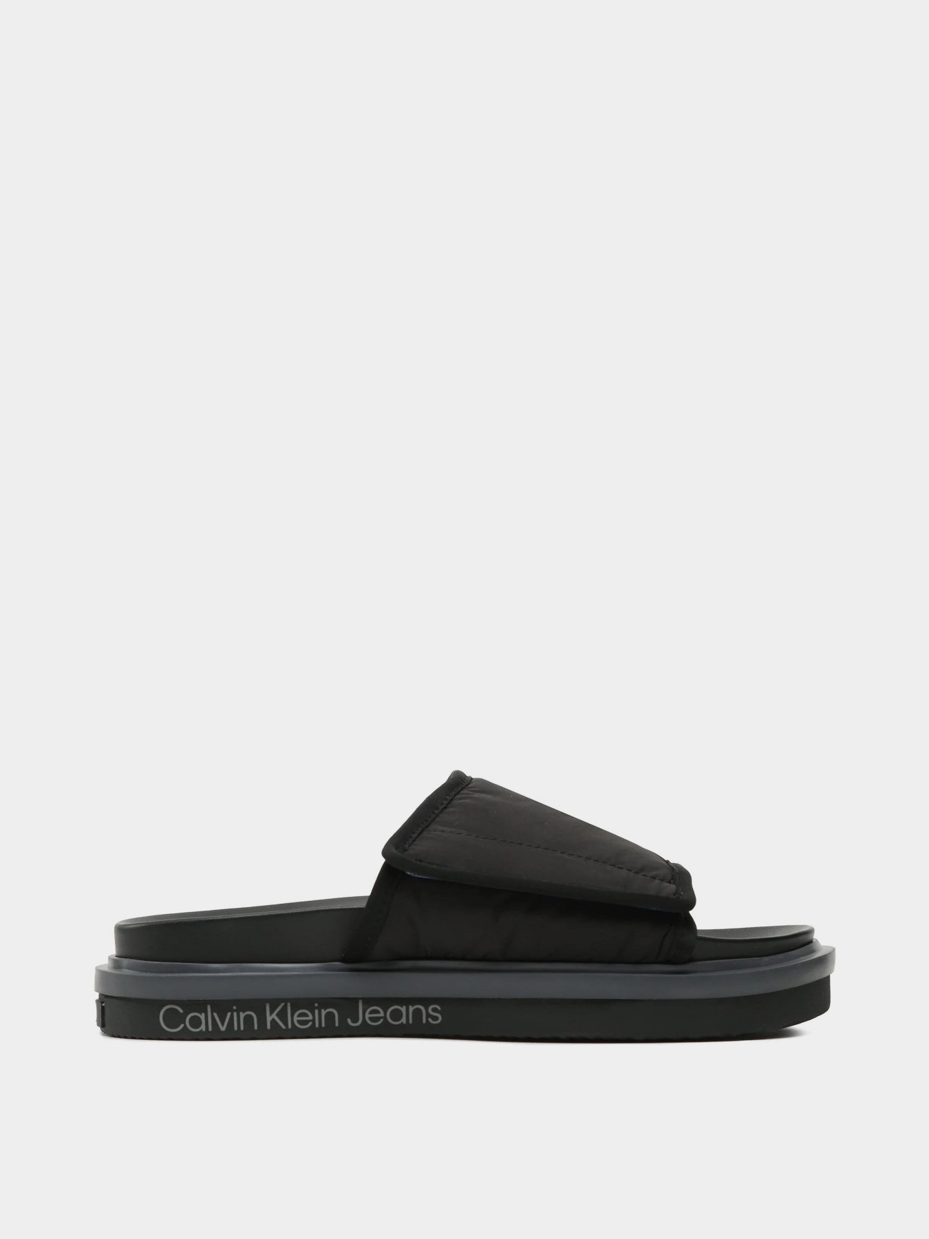 Шлепанцы Calvin Klein Sandal Slide Softny модель YM0YM00644-0GP Шлепанцы Calvin Klein Sandal Slide Softny модель YM0YM00644-0GP Фото