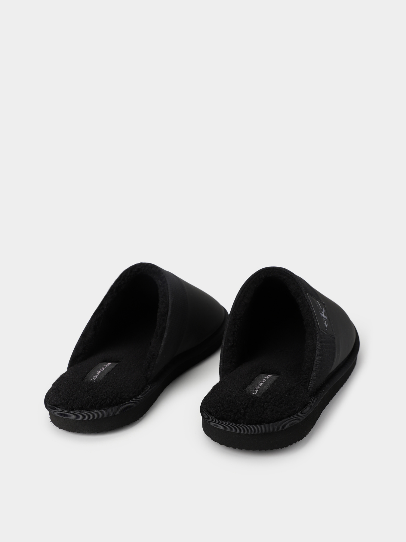 Тапки Calvin Klein Faux Leather Mule Slippers модель YM0YM00758-00T Фото