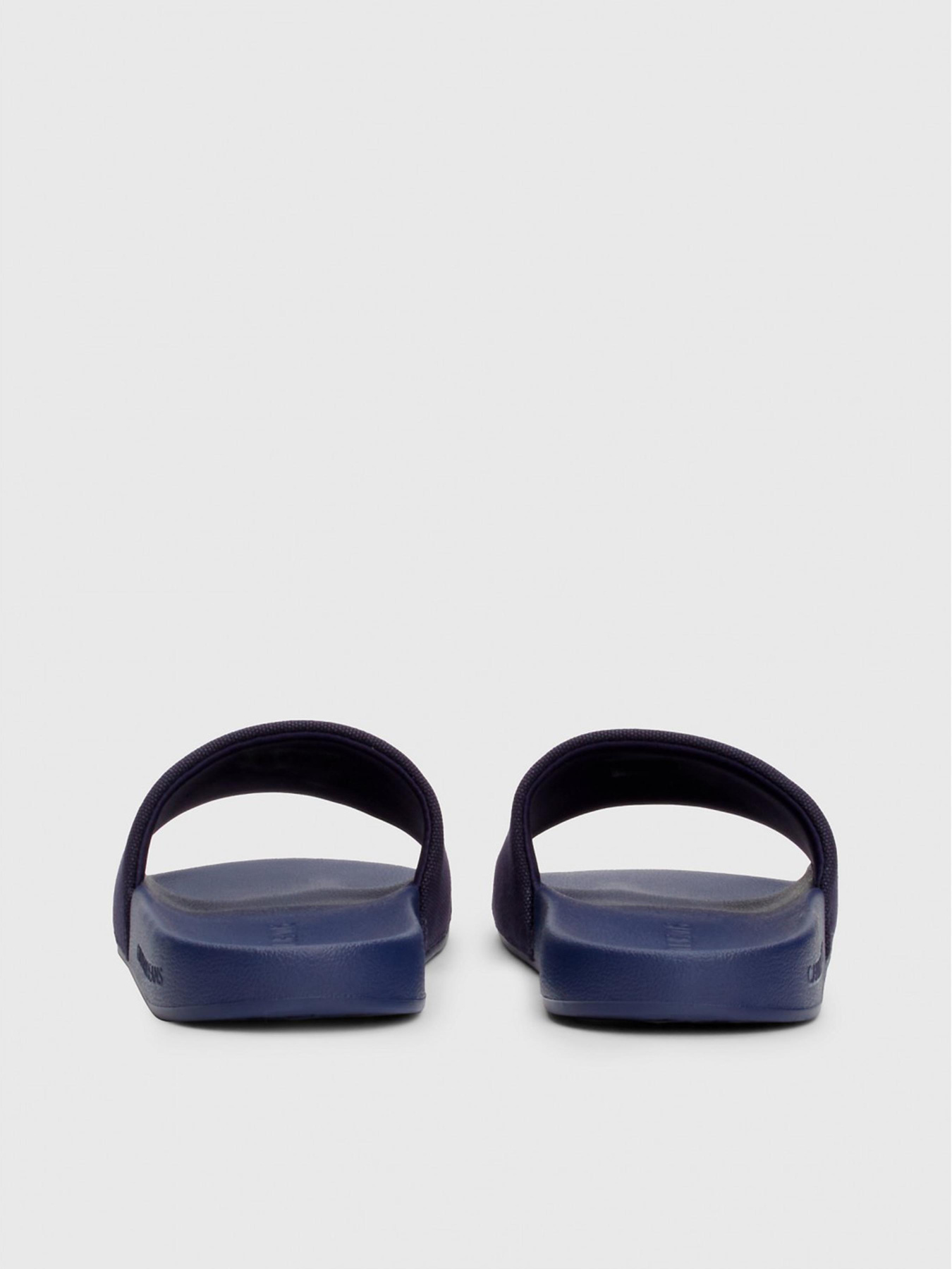 Шлепанцы Calvin Klein Slide Monogram Co модель YM0YM00061-0GY Фото