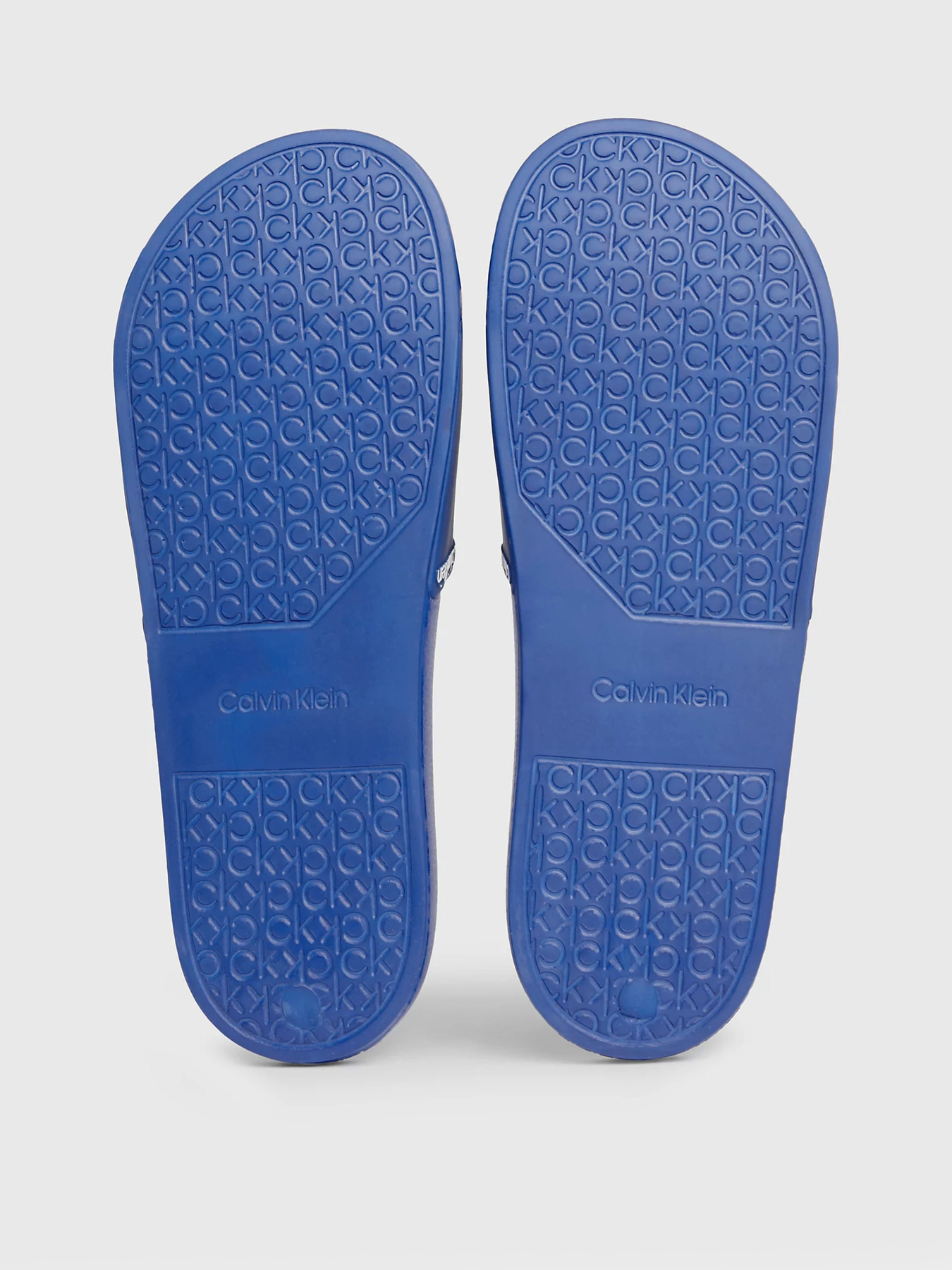 Шльопанці Calvin Klein Pool Slide Rubber модель HM0HM00981-C41 Фото