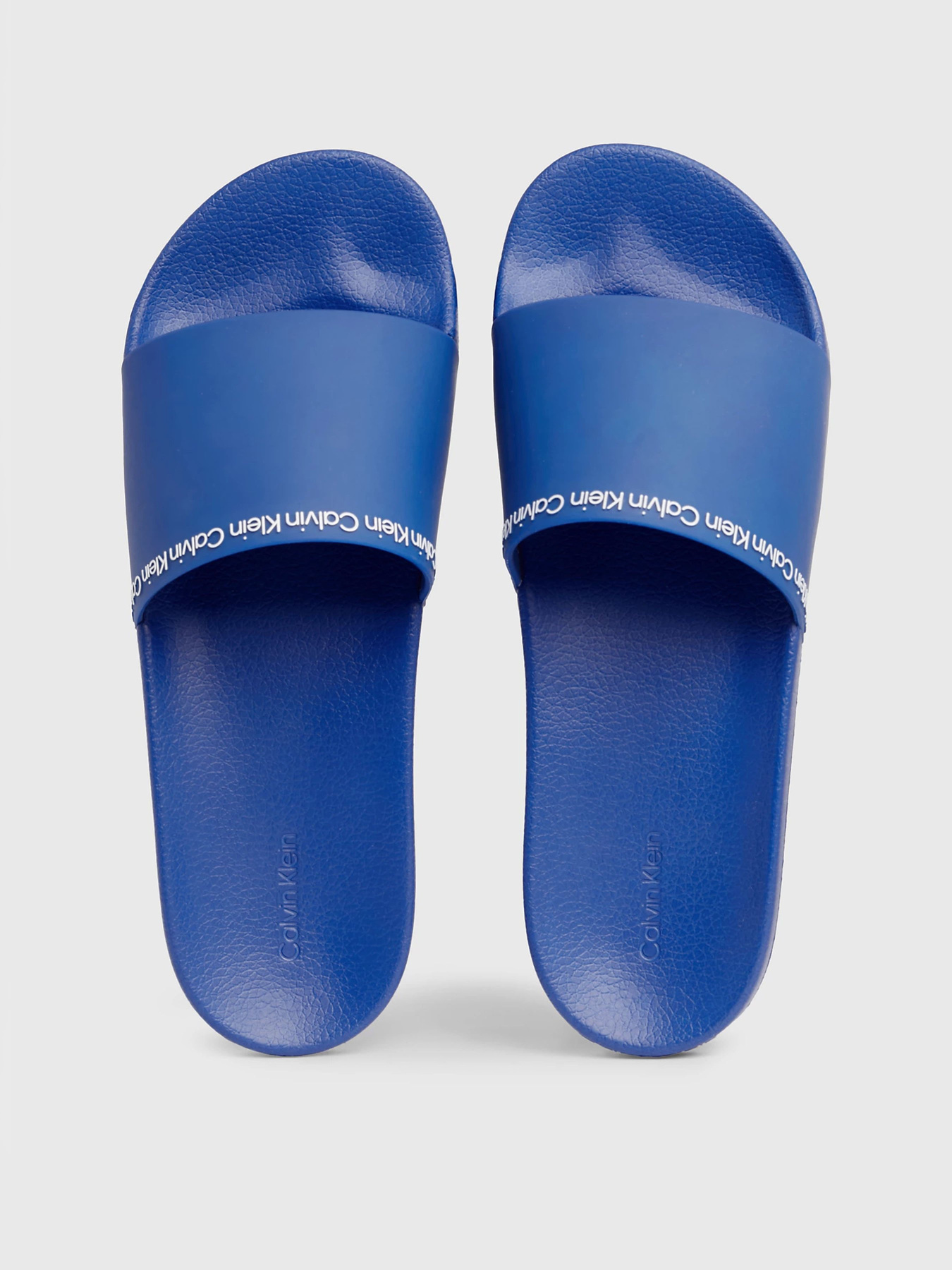Шльопанці Calvin Klein Pool Slide Rubber модель HM0HM00981-C41 Фото