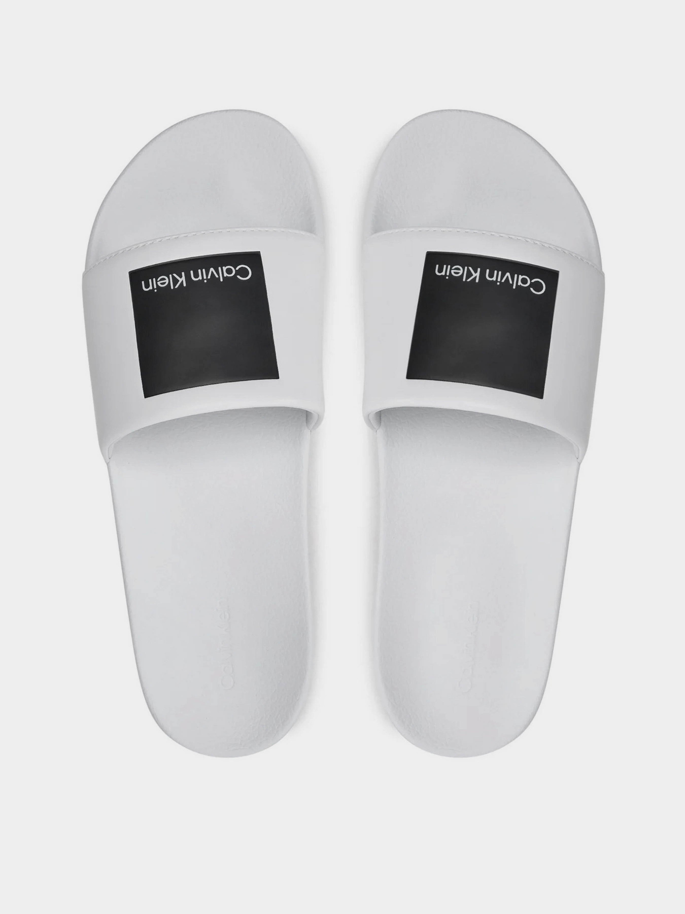 Шлепанцы Calvin Klein Pool Slide Hf Logo модель HM0HM01466-YBR Фото