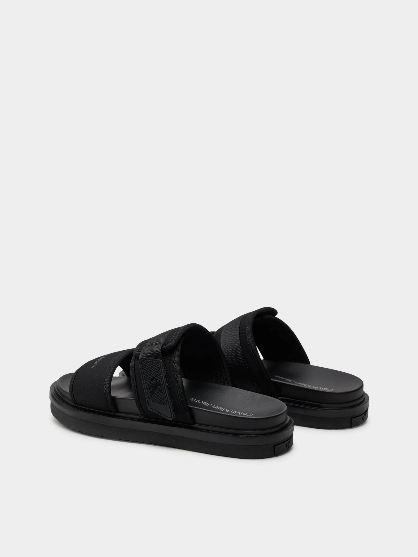Шлепанцы Calvin Klein Double Bar Sandal Wb In Br модель YM0YM00946-0GT Фото