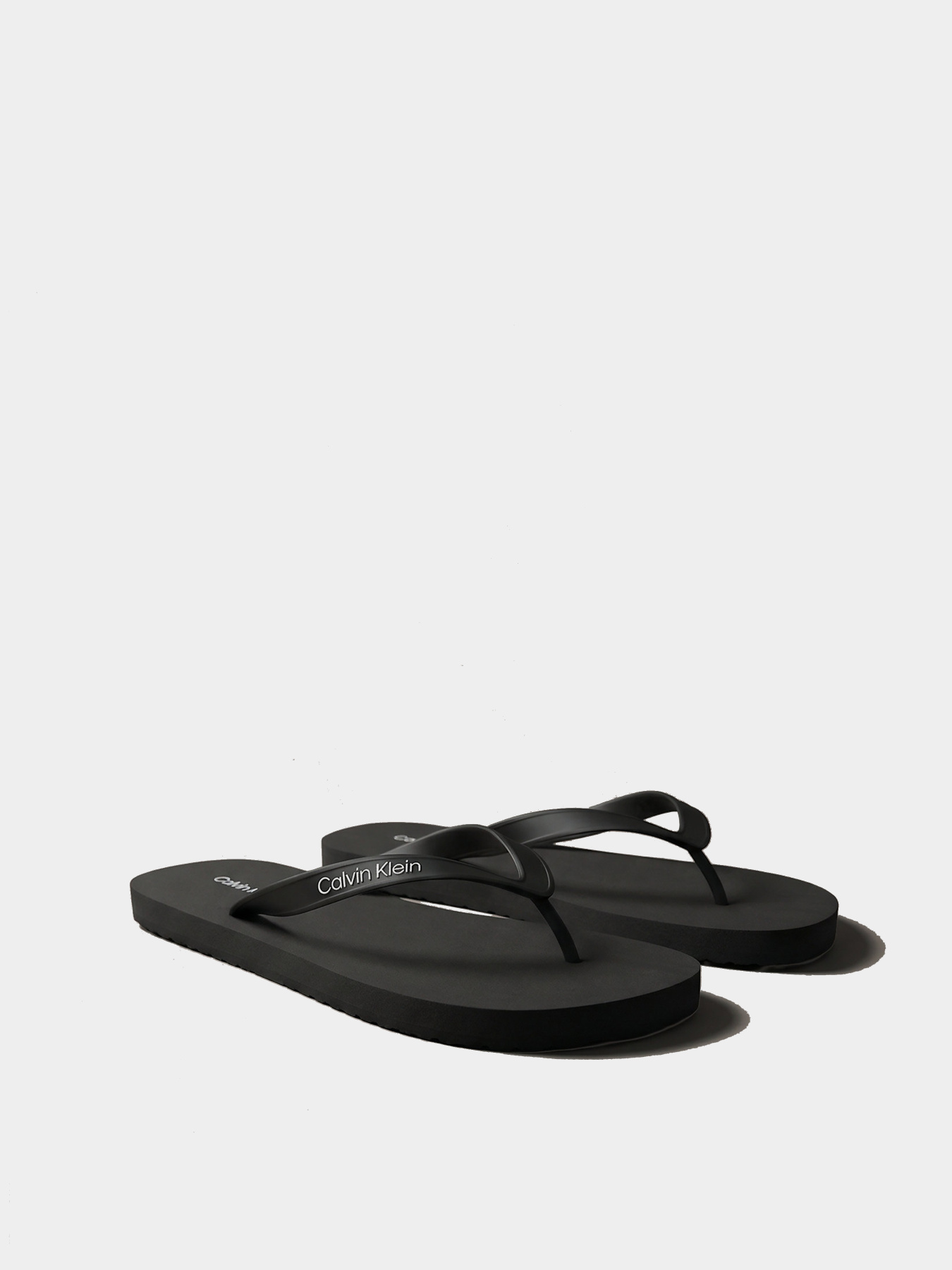 В'єтнамки Calvin Klein BEACH THONG SLIDE модель HM0HM02105-0GJ Фото