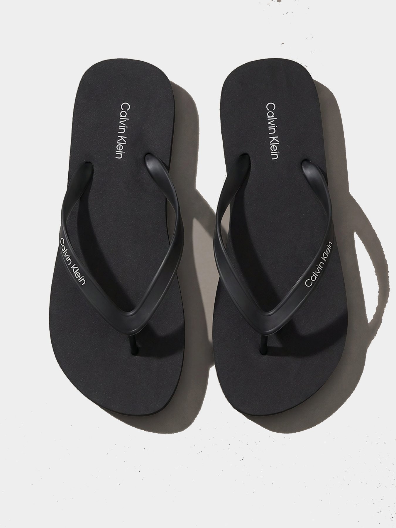 В'єтнамки Calvin Klein BEACH THONG SLIDE модель HM0HM02105-0GJ Фото