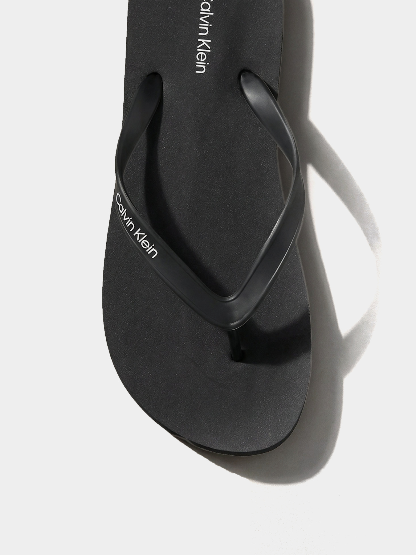 Шлёпанцы Calvin Klein BEACH THONG SLIDE модель HM0HM02105-0GJ Фото