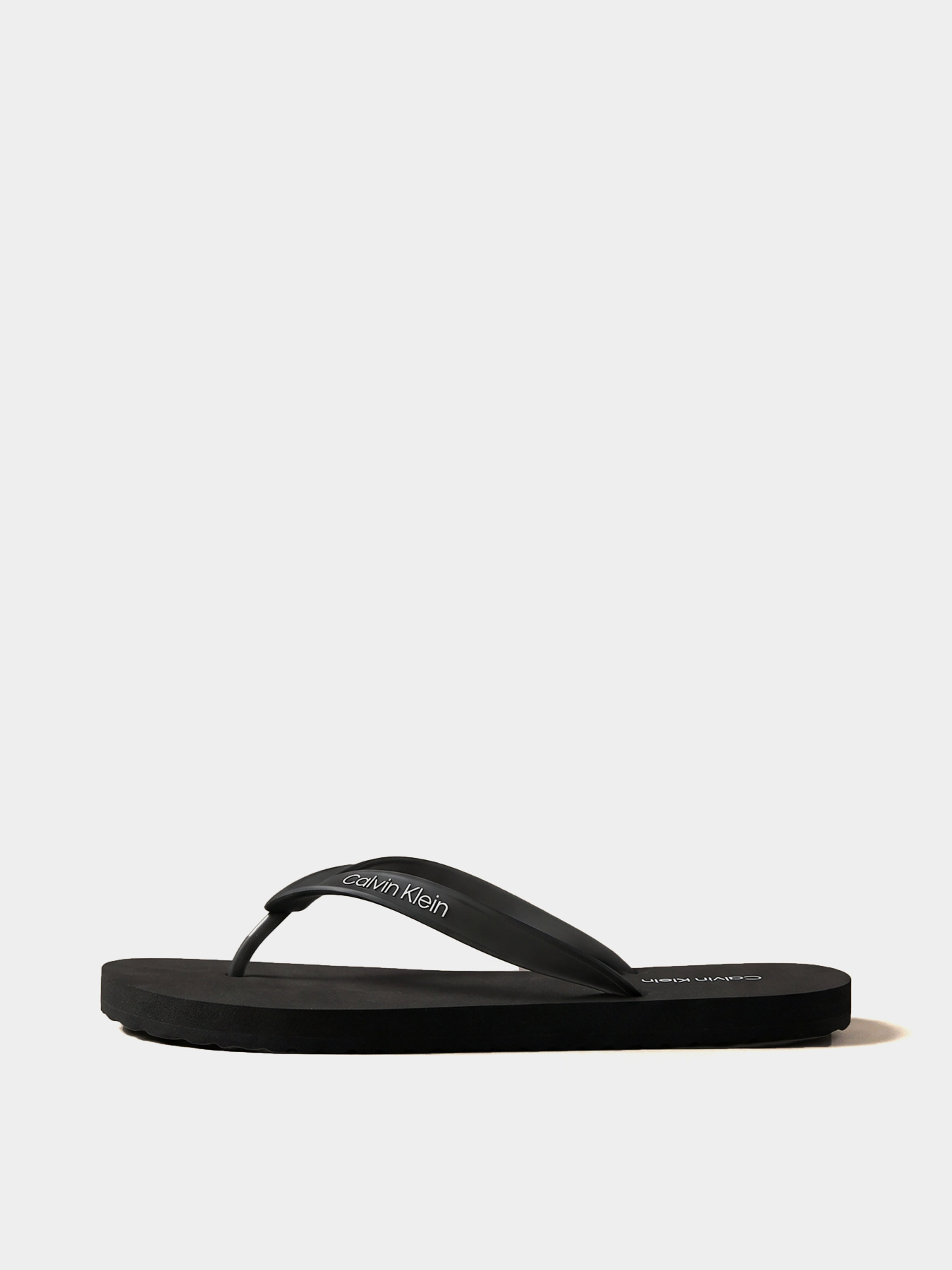 Шлёпанцы Calvin Klein BEACH THONG SLIDE модель HM0HM02105-0GJ Фото