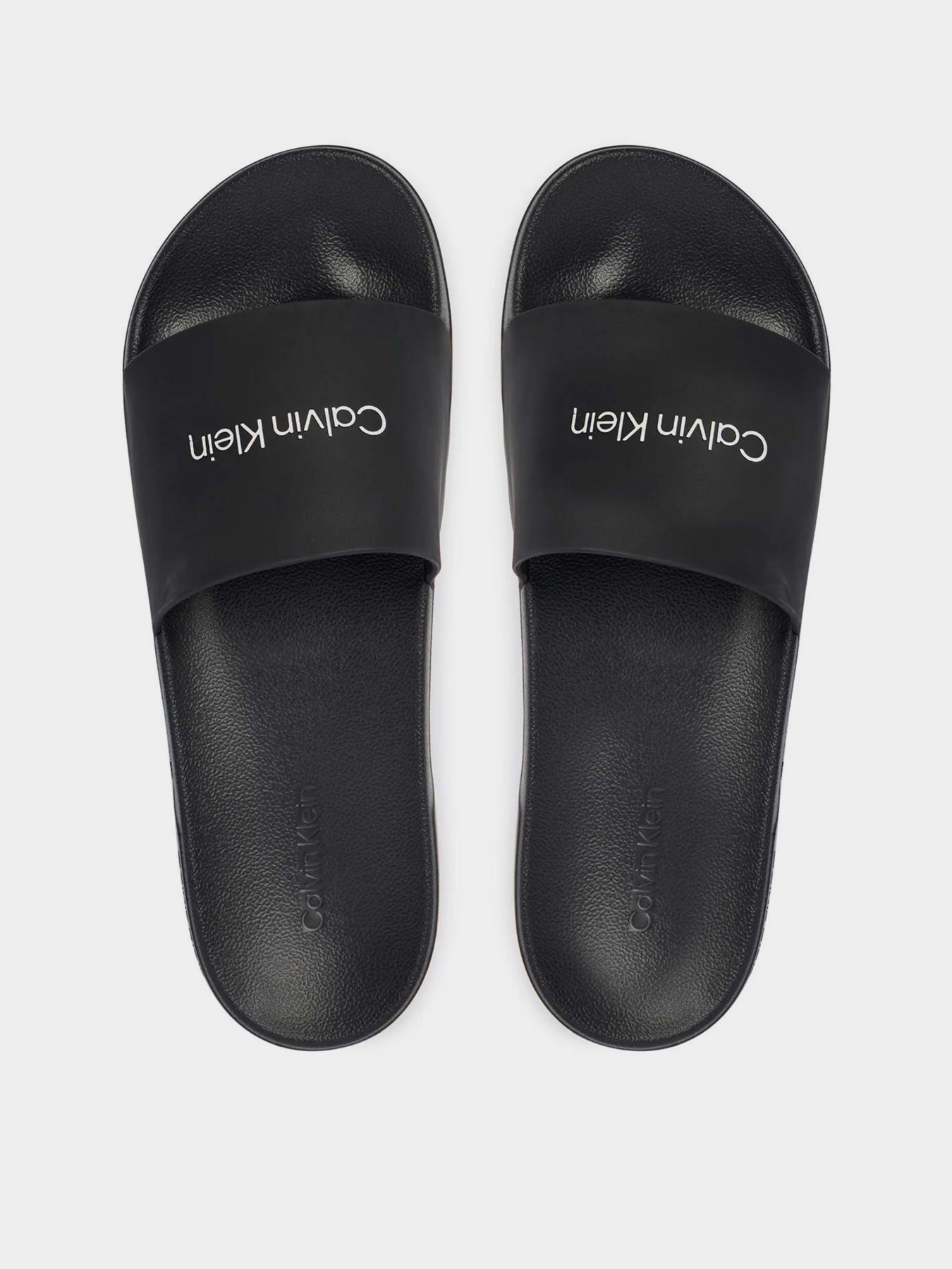 Шлепанцы Calvin Klein ESS SLIDE MONOBRAND CV модель HM0HM02107-0GJ Фото