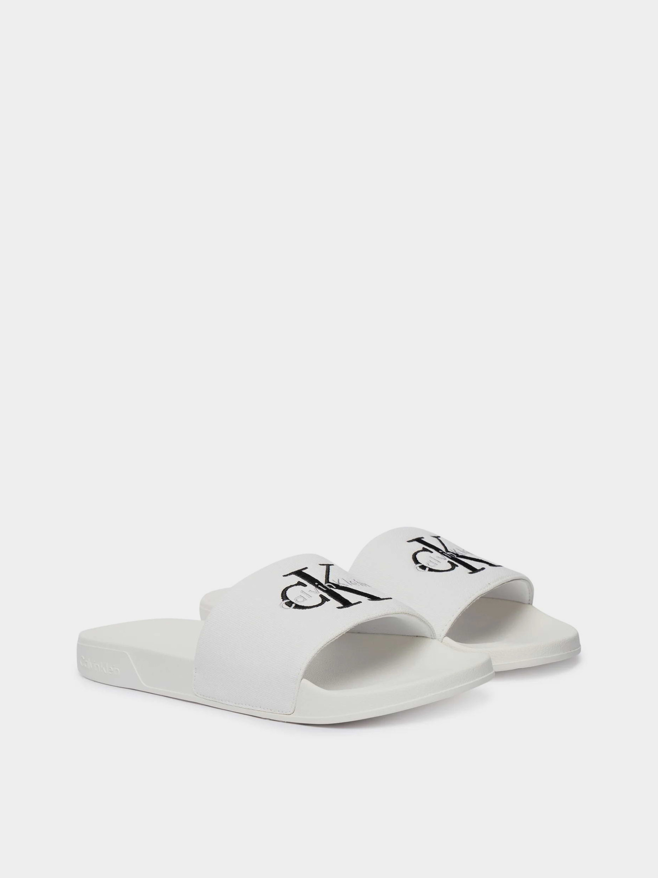 Шлепанцы Calvin Klein ESS SLIDE CV модель YM0YM01393-0K4 Фото