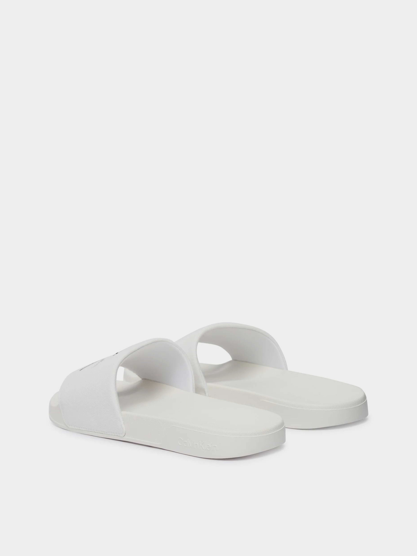 Шлепанцы Calvin Klein ESS SLIDE CV модель YM0YM01393-0K4 Фото