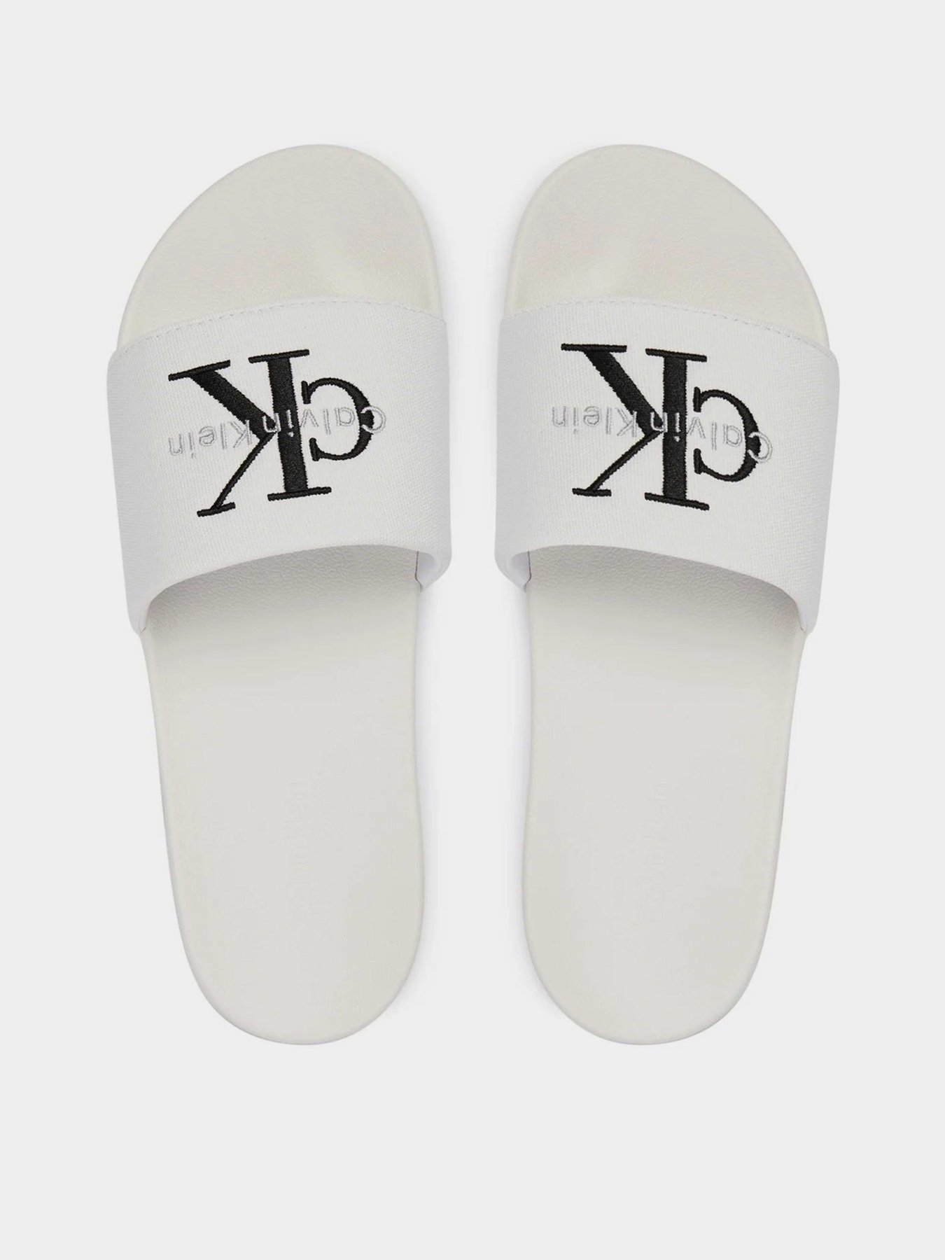 Шлепанцы Calvin Klein ESS SLIDE CV модель YM0YM01393-0K4 Фото