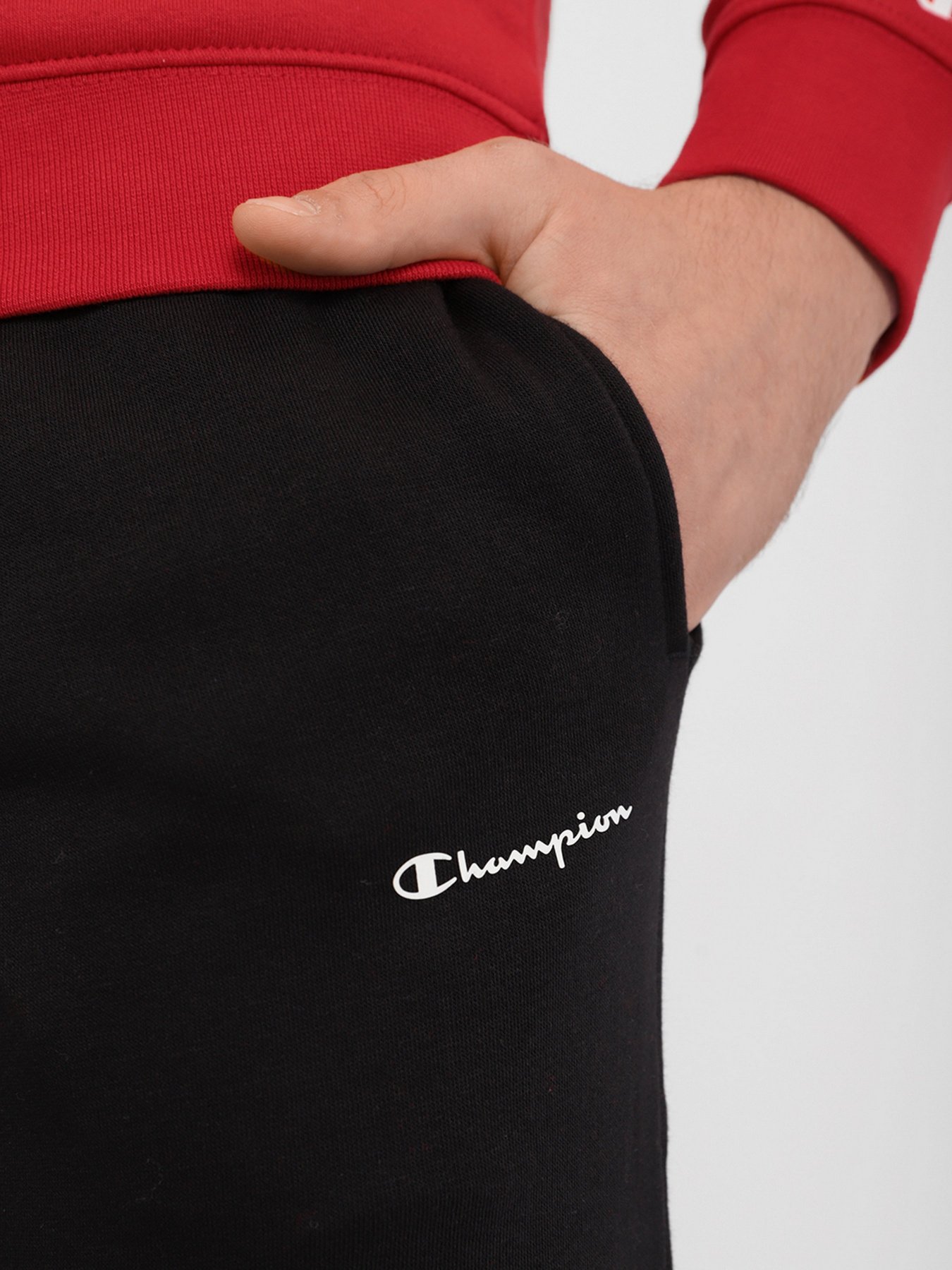 Спортивні штани Champion ELASTIC CUFF PANTS модель cha214955-NBK Фото