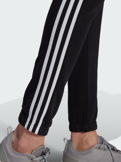 Штани спортивні adidas Essentials 3-Stripes модель GK8829 — фото 5 - INTERTOP