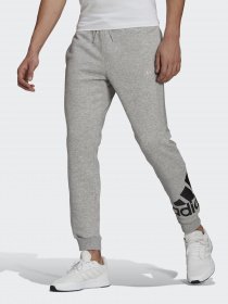 Штаны спортивные Adidas ESSENTIALS FLEECE TAPERED CUFF LOGO модель GK8969 Фото