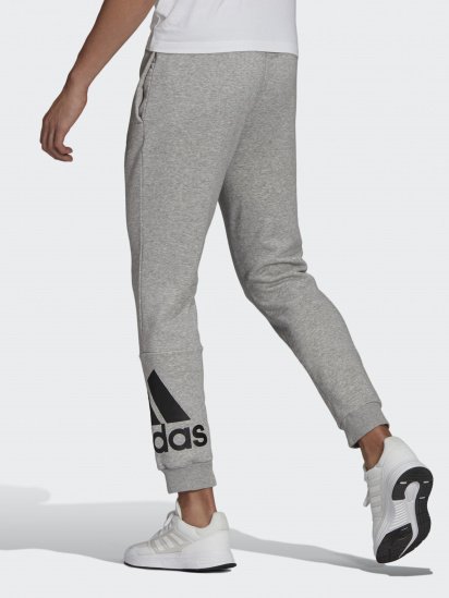 Штани спортивні adidas ESSENTIALS FLEECE TAPERED CUFF LOGO модель GK8969 — фото - INTERTOP