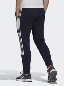 Штаны спортивные Adidas ESSENTIALS FLEECE TAPERED CUFF 3-STRIPES модель GK8977 Фото