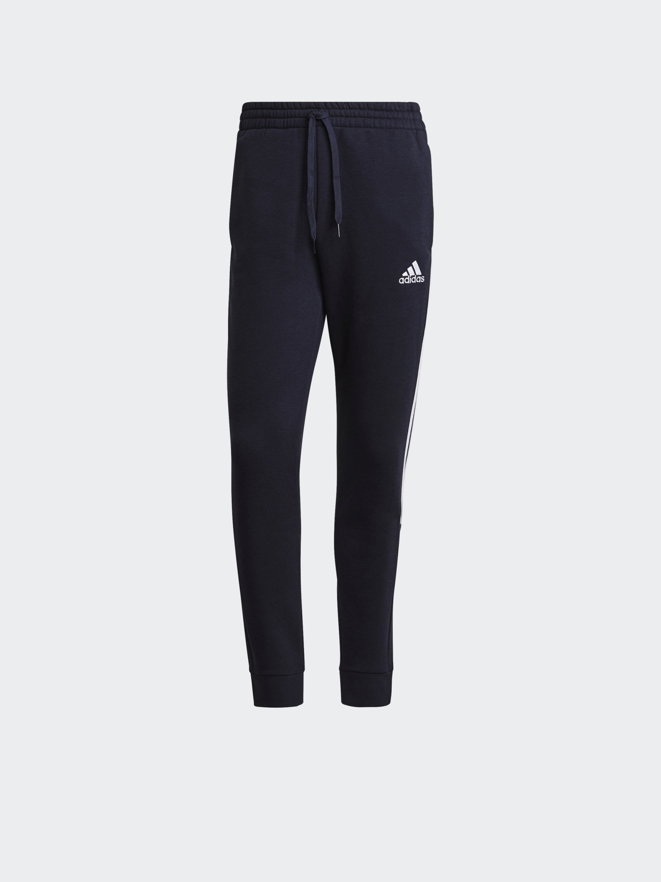 Спортивні штани Adidas ESSENTIALS FLEECE TAPERED CUFF 3-STRIPES модель GK8977 Фото