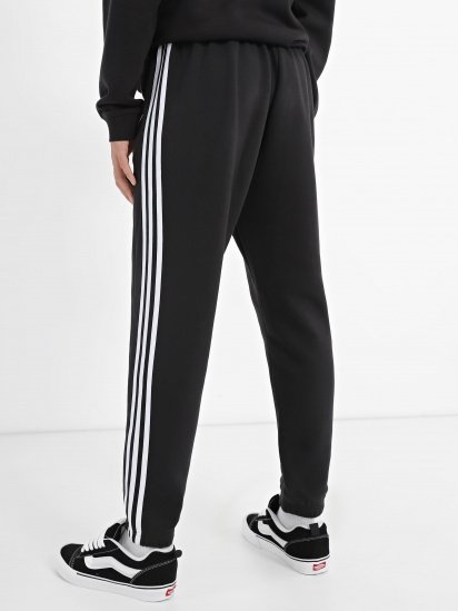 Штани спортивні adidas Essentials Fleece 3-Stripes Tapered Cuff модель IB4038 — фото 3 - INTERTOP