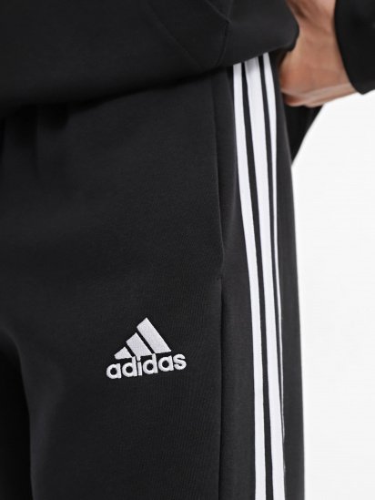 Штани спортивні adidas Essentials Fleece 3-Stripes Tapered Cuff модель IB4038 — фото 4 - INTERTOP