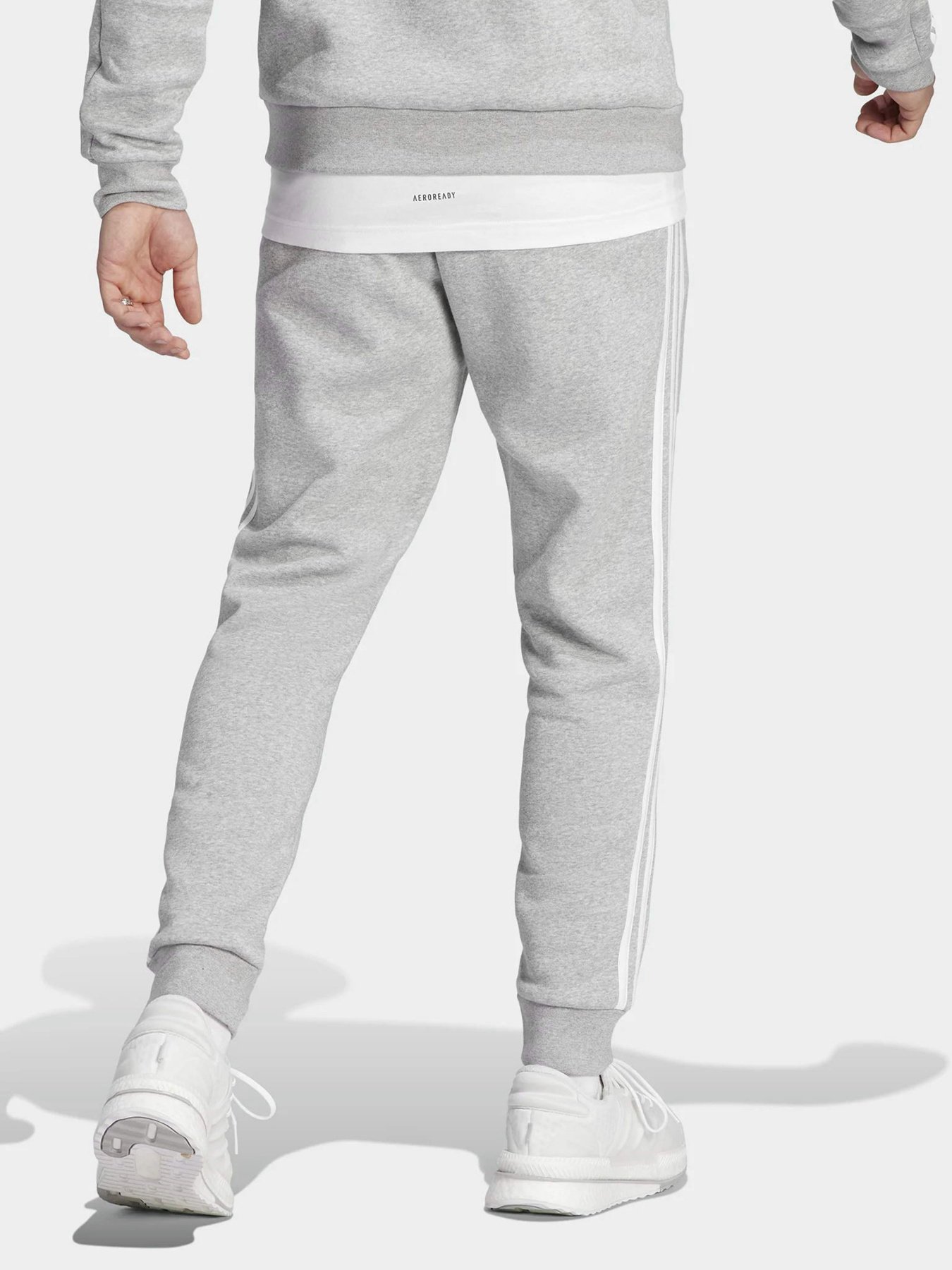 Штани спортивні Adidas Essentials Fleece 3-Stripes Tapered Cuff модель IJ6494 Фото