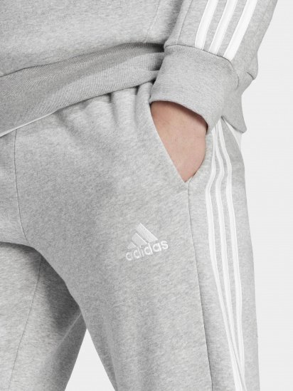 Штани спортивні adidas Essentials Fleece 3-Stripes Tapered Cuff модель IJ6494 — фото 4 - INTERTOP