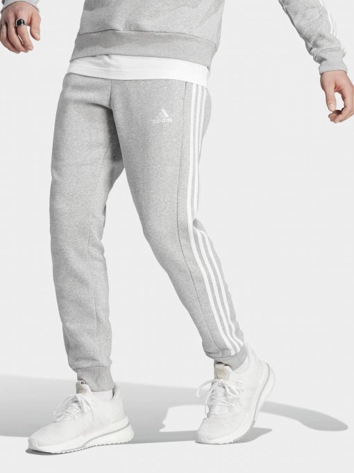Штаны спортивные Adidas Essentials Fleece 3-Stripes Tapered Cuff модель IJ6494 Фото