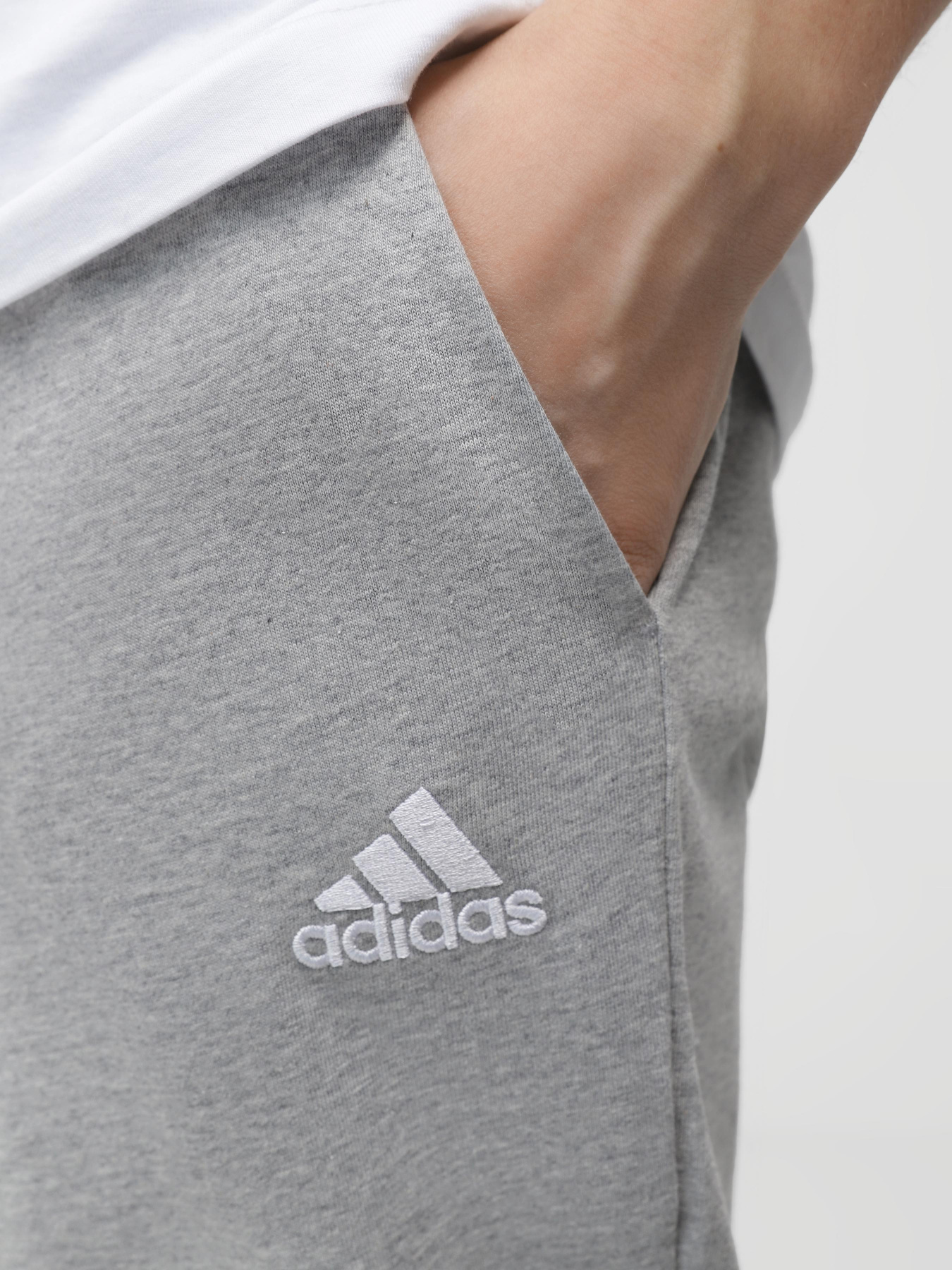 Штаны спортивные Adidas ESSENTIALS JERSEY TAPERED модель IC9411 Фото