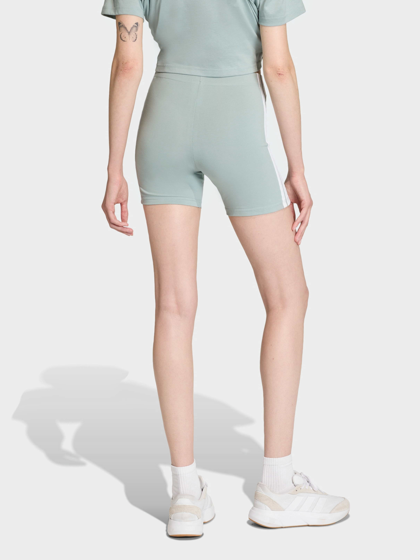 Спортивні шорти Adidas ESSENTIALS 3-STRIPES HIGH WAIS модель KC5190 Спортивні шорти Adidas ESSENTIALS 3-STRIPES HIGH WAIS модель KC5190 Фото