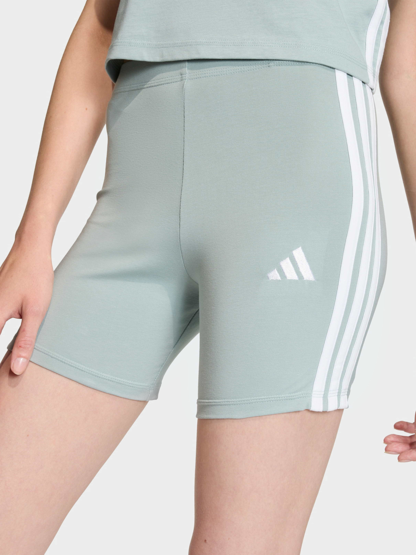 Спортивні шорти Adidas ESSENTIALS 3-STRIPES HIGH WAIS модель KC5190 Спортивні шорти Adidas ESSENTIALS 3-STRIPES HIGH WAIS модель KC5190 Фото