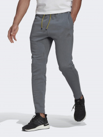 Штани спортивні Adidas SPORTSWEAR TAPERED модель GM6505 Фото