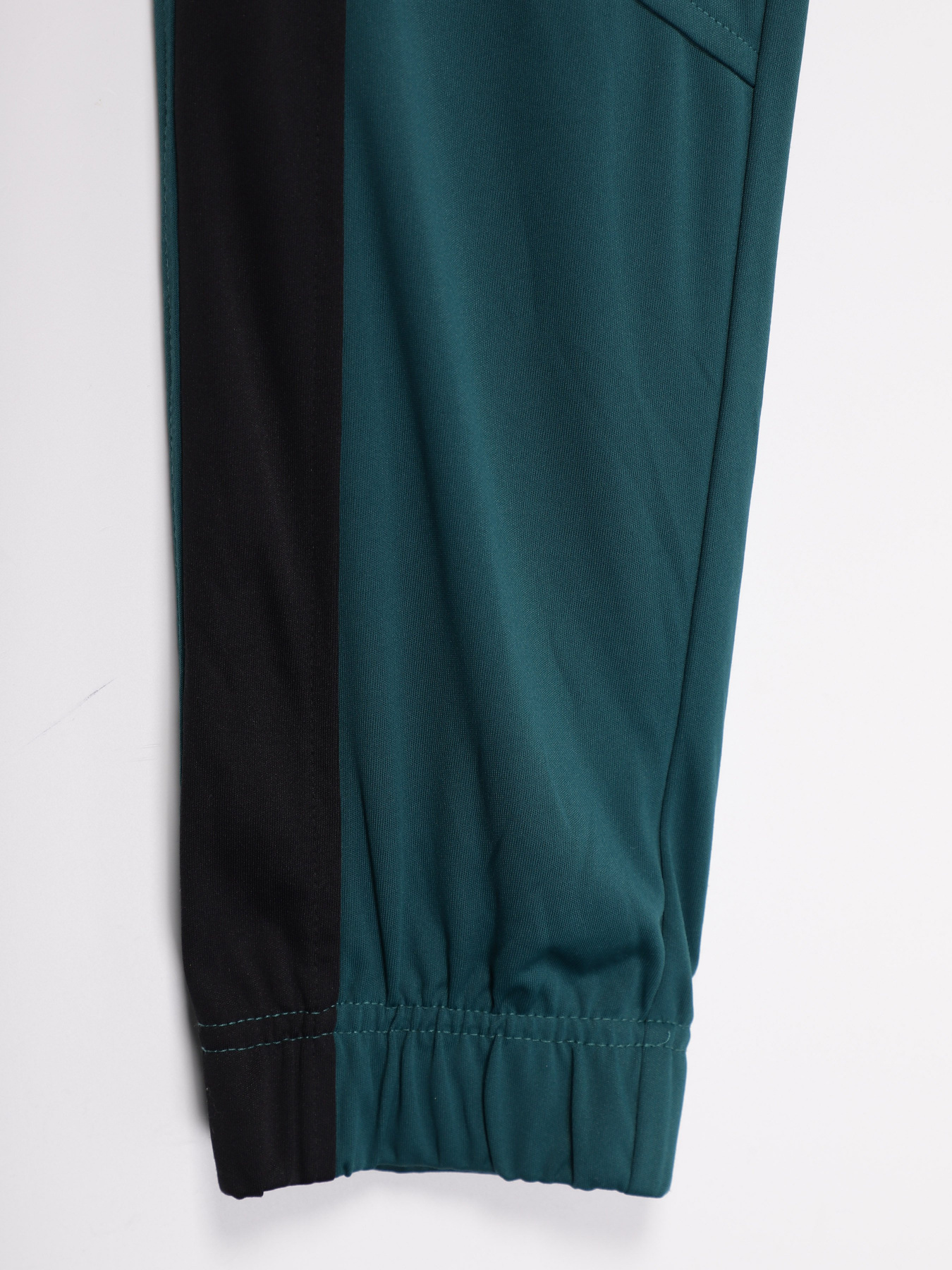 Штаны спортивные Crivit модель IAN3016864_т.бірюзовий з чорним Фото