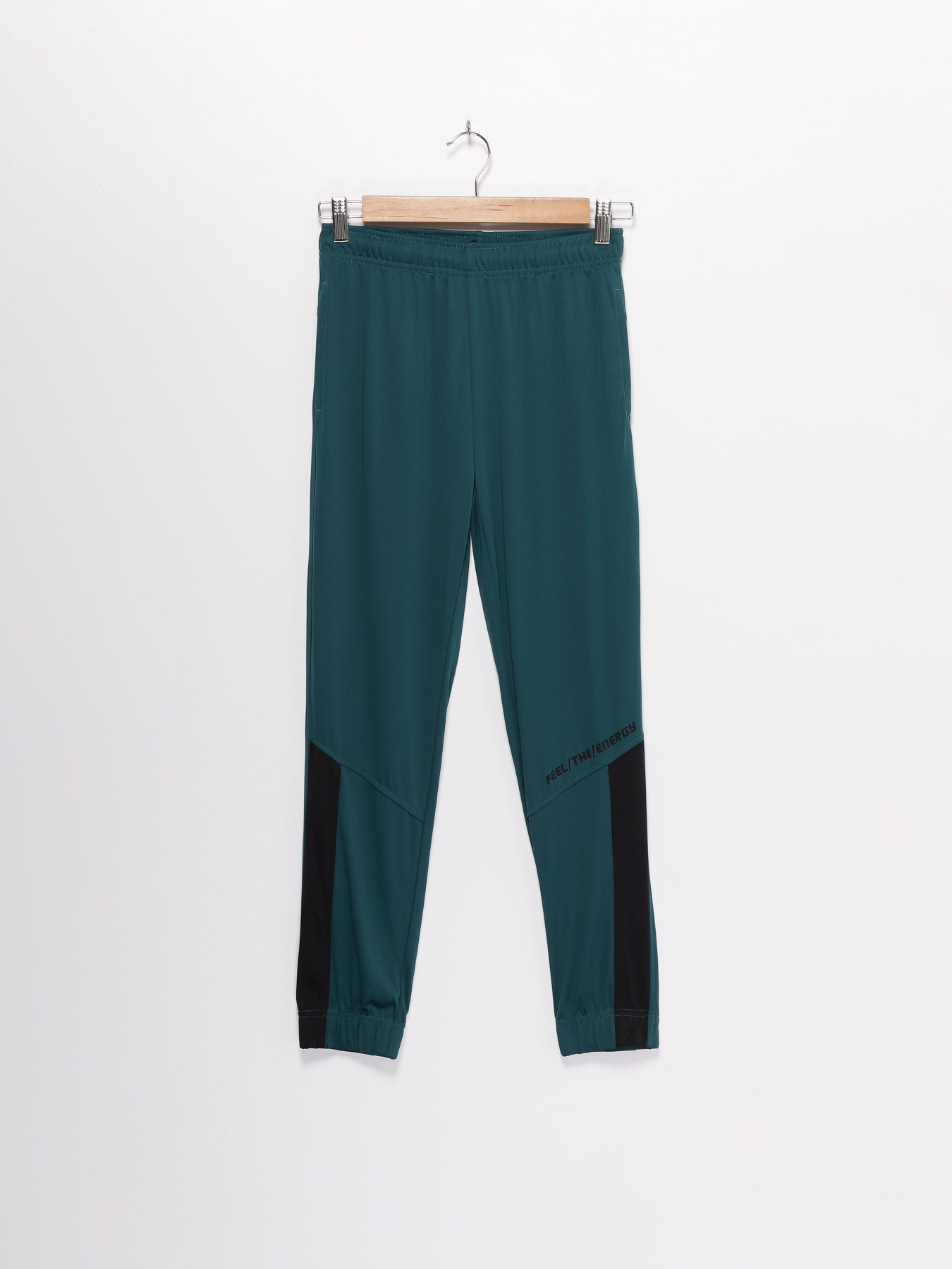 Штаны спортивные Crivit модель IAN3016864_т.бірюзовий з чорним Фото