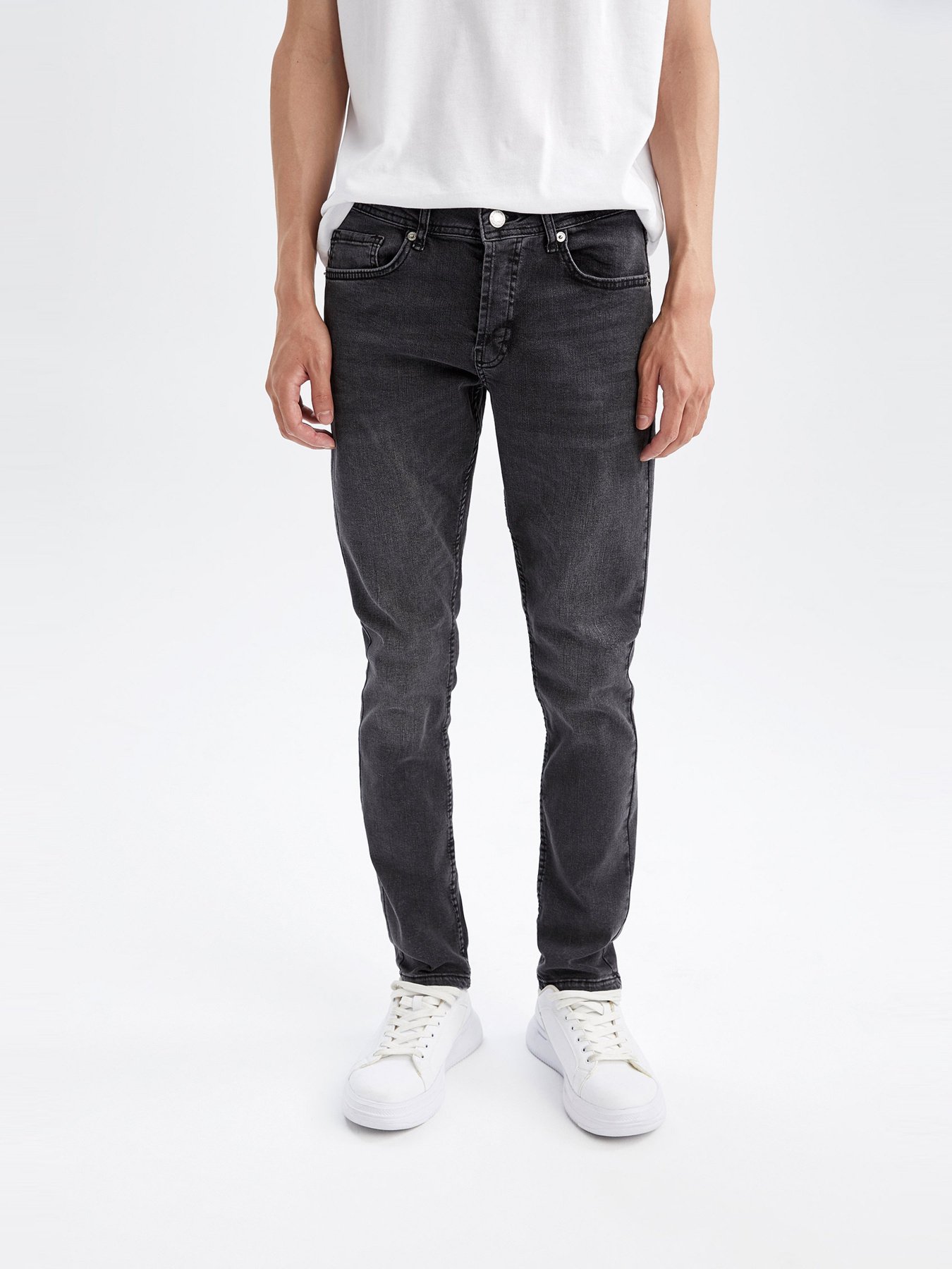 Завужені джинси DeFacto модель X8869AZ-NM36 Фото