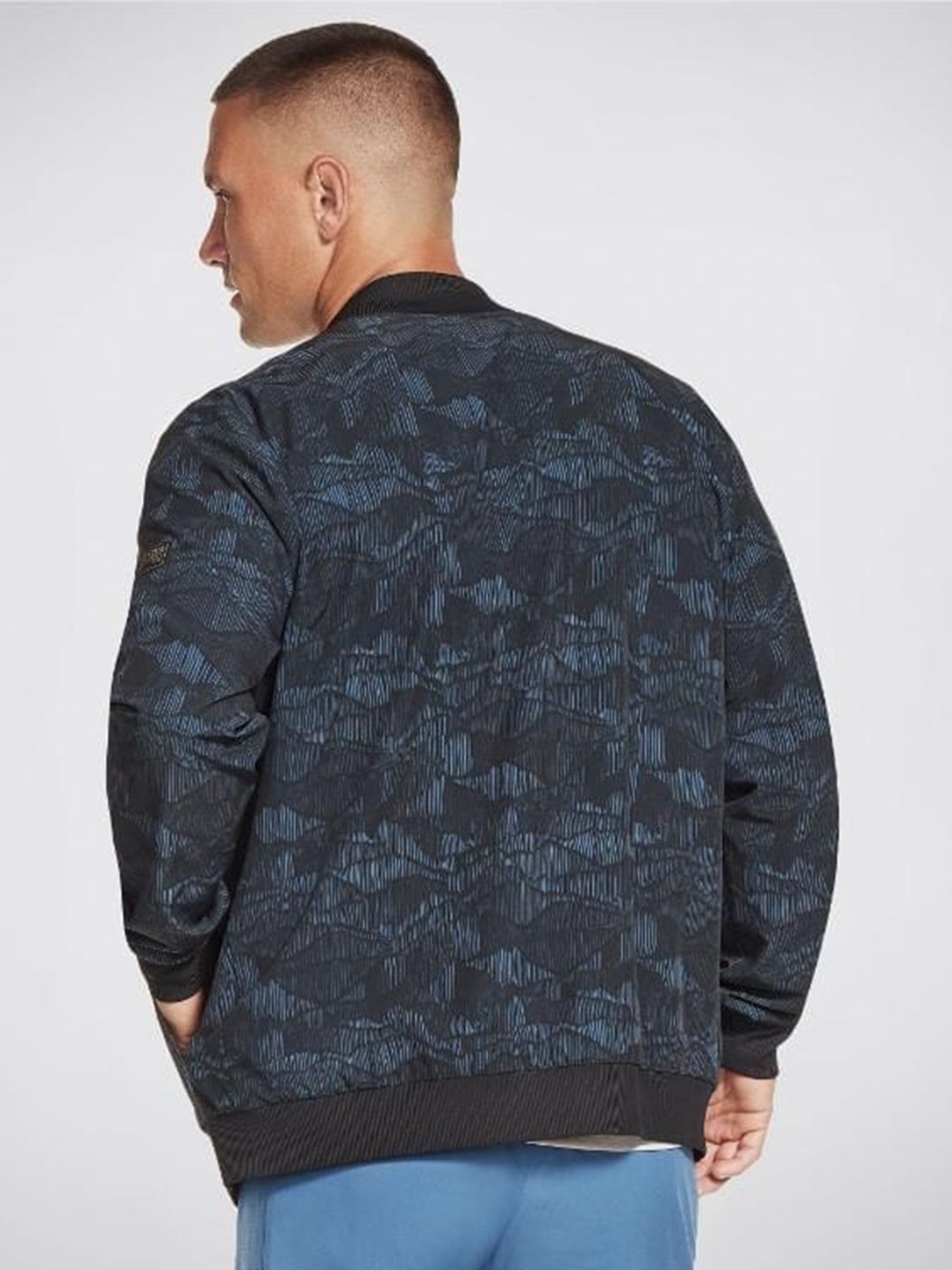 Бомбер Skechers Apparel GOwalk Reversible модель M1JA168 BLBK Фото