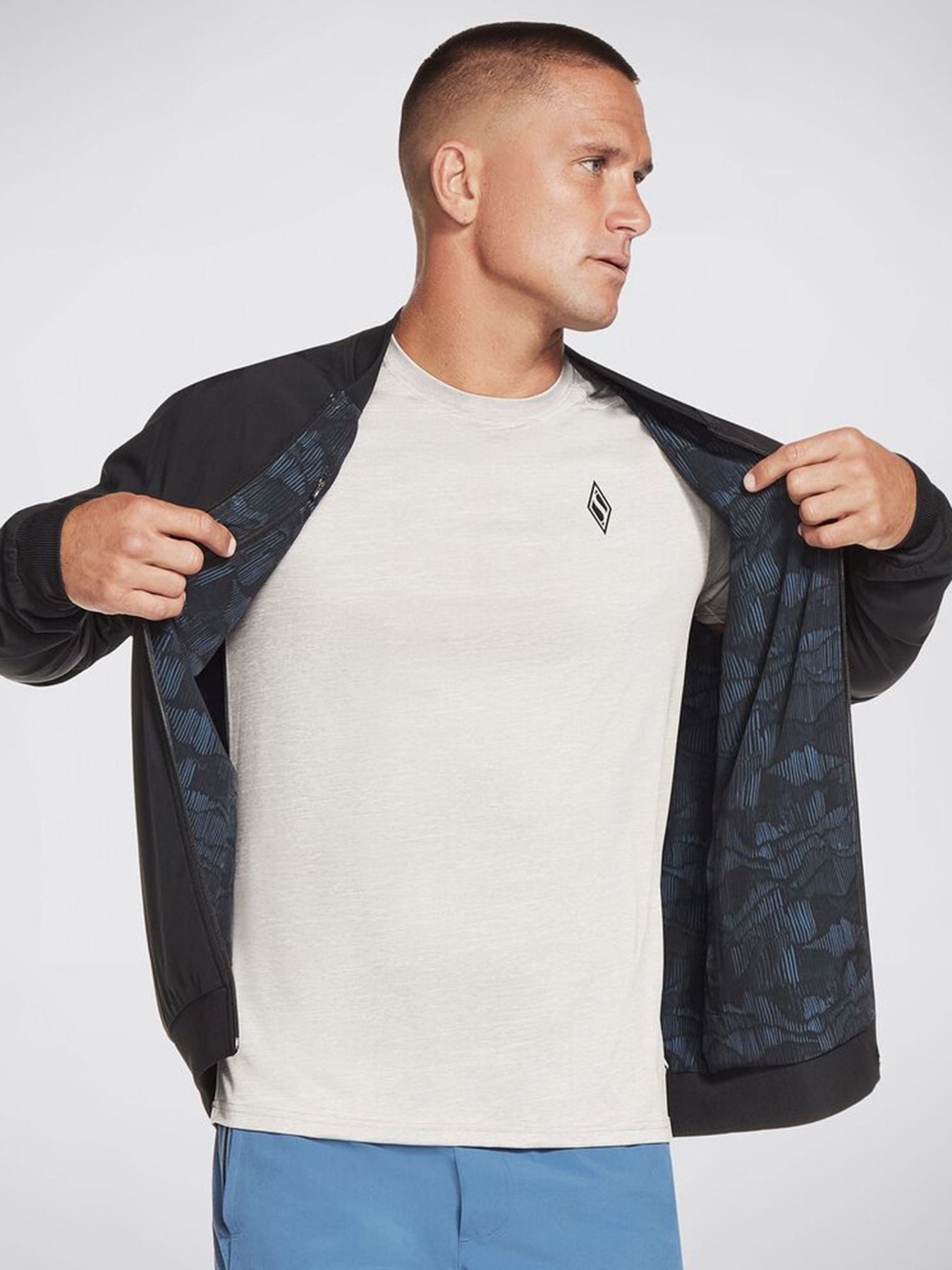 Бомбер Skechers Apparel GOwalk Reversible модель M1JA168 BLBK Фото